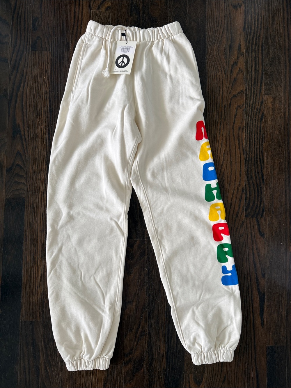 Madhappy Cream Sweatpants with Rainbow Side Letters